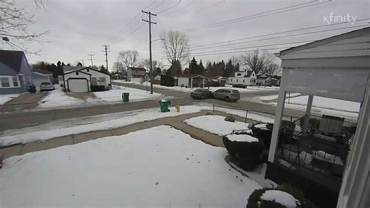 Video shows two cars crash in intersection, sending one into home