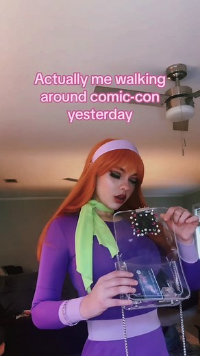 Like Daphne is ever low on cash, but we all know she doesn’t really need it💜💚 #daphneblake #daphne #daphnecosplay #daphneblakecosplay #scoobydoocosplay #scoobydoo #scoobydoobydoo #imcuteigetby #daphnemakeup