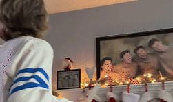 Brothers recreate childhood photos for heartwarming Christmas surprise to parents