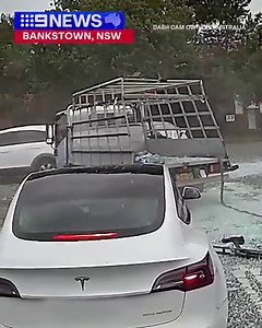 Shocking dashcam footage has captured the moment a truck and a car collide, causing shattered glass to explode across a Bankstown road. Remarkably, nobody was hurt in the crash. #9News | 9 News