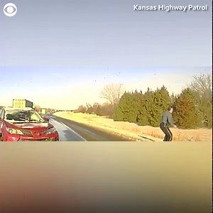 4.6K views · 79 reactions | This Kansas Highway Patrol trooper jumped out of the way of a semi-truck while he was helping a stranded driver on February 17. KHP released video of the incident and said, after "narrowly avoiding being hit himself," Trooper Karl Koenig leapt back into action to rescue the driver and child inside the car. The governor just honored Trooper Koenig with a "Super Hero Award." | CBS 58 | Facebook