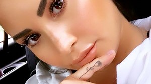 14 Beautiful And Meaningful Celebrity Hand Tattoos