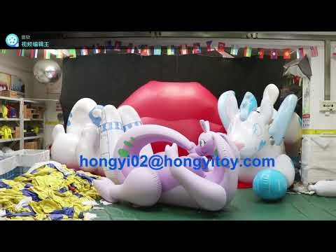 giant inflatable goodra dragon and inflatable wolf ride