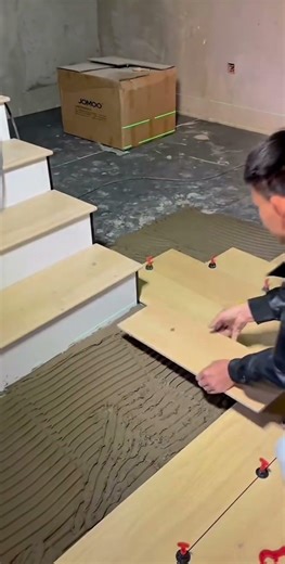 Tutorial on how to quickly and smartly install wood-look ceramic tile flooring #woodworking #shorts