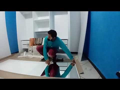 montagem de guarda-roupa Bartira 3 portas de correr com espelho e 4 gavetas.