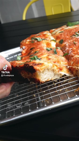 2K views · 41 reactions | Chef Christian Petroni’s first special is up for grabs at Zoli’s today!! Christian recently amped up our vodka sauce recipe and wants to show it off with a simple square pie SMOTHERED in vodka sauce, with a sesame seed and parm crusted undercarriage!! Add whatever toppings you want or try the vodka straight up! | Zoli's NY Pizza | Facebook