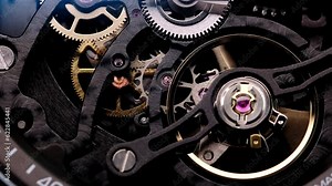 Gear drive motion in skeleton watch. Mechanical watches with gears and cogs. Watch or clock mechanism. Clockwork details and parts. Inside watch, mechanical watch in macro view.Macro Shot Clock Face