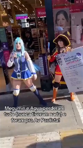 Aqua e Megumin perderam tudo e foram para o Brasil trabalhar numa feirinha