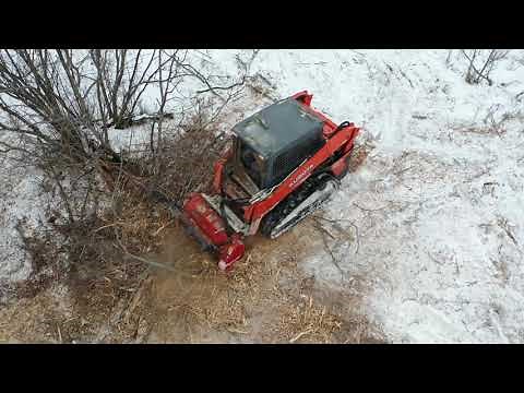 Kubota SVL65-2 with the all new Fecon RK5015 standard flow mulch head