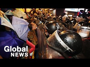 Thai protests: Violent clashes erupt as police fire water cannon at defiant protesters