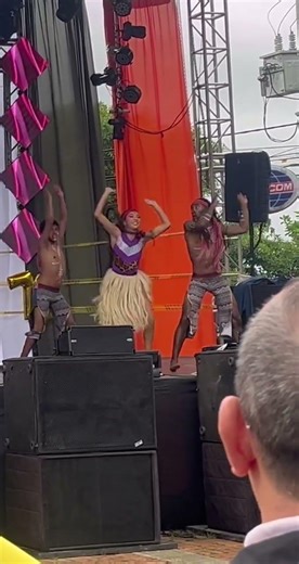Dancer Tumbles During Energetic Stage Performance