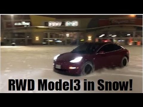 Tesla RWD Model 3 In The Snow