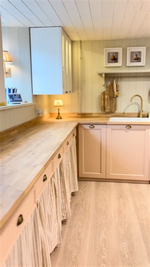 Alex and Jamie Lesinski | Country house renovation on Instagram: "Behold! The kitchen cabinet’s curtains were a revelation for us - a cute country upgrade that didn’t cost the earth. Comment ‘Kitchen’ and we’ll DM you the links to all the products (including hardware, paint colours and lighting) we used in our kitchen upgrade 🤎 *ad - aff links*"