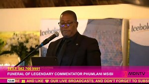 Gauteng Premier Panyaza Lesufi delivered a heartfelt tribute at the funeral of renowned sports commentator Phumlani Msibi, praising his remarkable contribution to South African sports broadcasting. Lesufi commended Msibi for his unique ability to accommodate players who were not fluent in English during post-match interviews. | MDN News