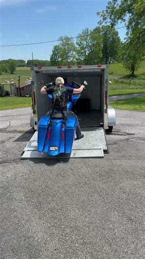 Blue Harley in the trailer, black Harley on the road to the Lake of the Ozarks. #harleydavidson