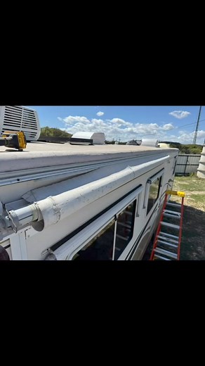 Just a one man job when it comes to slidetopper or awning fabric replacement. | Scruss Man RV Repair