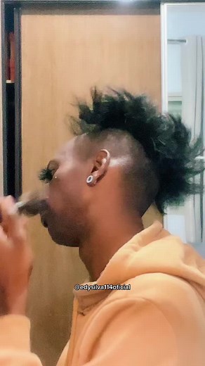 Mohawk Hairstyle and Makeup Tips in a Bathroom