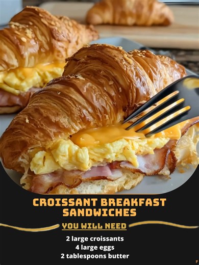 Croissant 📢 Breakfast Sandwiches Ingredients 2 large croissants 4 large eggs 2 tablespoons butter 4 slices cheddar cheese 4 slices cooked bacon ..... Full Recipe in Coʍmеոτ 💬 🤣 | Recipe Exchange