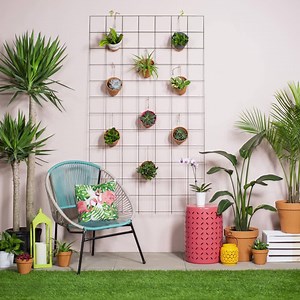 It’s time to get organized! Your outdoor space deserves an upgrade with our DIY Rebar Wall Organizer. | The Home Depot
