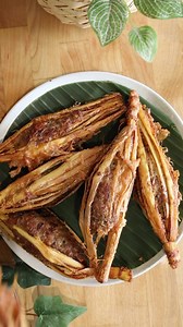 4.2M views · 59K reactions | This recipe is from Phia Sing’s book. A traditional Lao recipe called Ua Sikhai aka Lao stuffed lemongrass #laofood #phiasing #lemongrass #stuffedlemongrass #foodietiktok #foodhistory #laofoodmovement #lao #laos #porkrecipes #asianfood #foodstory #storytime | Saeng Douangdara | Facebook