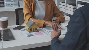 Lawsuits against Real estate agent and realtor general liability insurance businessman professional discussing and consultant with house toy model building before sign a contract with law concept