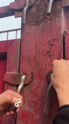 the stage of installing a nut on a fastener on a truck to make it more sturdy