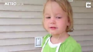 Girl extracts her own tooth with a bow and arrow