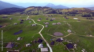 VELIKA PLANINA, SLOVENIA - JULY 23, 2015: Velika Planina is a dispersed high-elevation settlement of mostly herders' dwellings on the karst Big Pasture Plateau in the Kamnik Alps in Upper Carniola