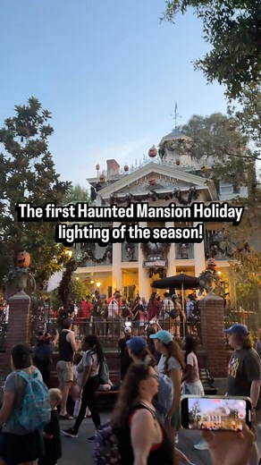 Every night at sunset, a short lighting ceremony happens at Haunted Mansion Holiday! Here is the first lighting of the season! #disneyland #hauntedmansion | Theme Park IQ