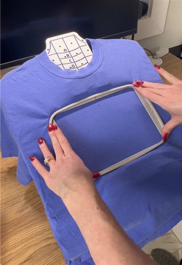 Finally got around to testing out my hooping station!! Honestly crazy how fast it made hooping this tshirt I am still in shock #machineembroidery #embroiderymachine #asmrsound #asmr #embroiderytutorial asmr process video of a machine embroidered tshirt that says “bi wife energy”