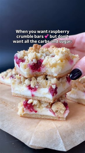 Sarah Kadison on Instagram: "KETO RASPBERRY CHEESECAKE BARS 💕🍰 Creamy vanilla cheesecake with juicy raspberries and a buttery crumble topping. Low-carb, gluten-free, and so easy to make! Perfect for Valentine’s Day dessert 💓 Comment RASPBERRY BARS and I’ll send the full recipe straight to your inbox! You can also find the full recipe on my blog baketobefit.com or Google “baketobefit raspberry cheesecake bars” #healthydessertrecipes #ketodessertrecipes"