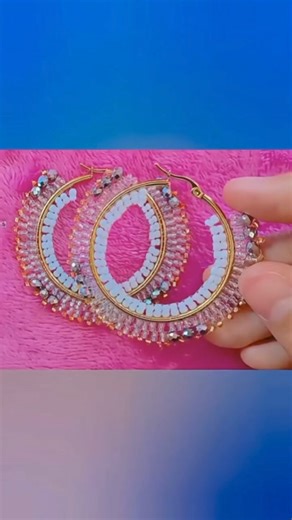 DIY: Beaded Hoop Earrings This video shows the step-by-step process of how to brick stitch on a hoop using seed beads and crystal beads. 📹@Arte_JM #lovebeads #beadedearrings #brickstitch #brickstitchearrings #beadedhoop #hoopearrings #beads #handmadeearrings #habdmadejewelry #beading #beadedjewelry #beadingtechnique #beadingtips #beads #beadingismedicine | Love Beads