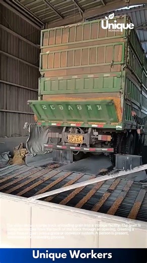 Unloading Grain: Truck Discharging Grain into a Facility