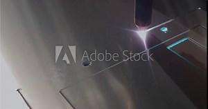 The work of a plasma cutter close-up. A plasma cutter cuts a detail, close-up. The work of the CNC plasma cutter