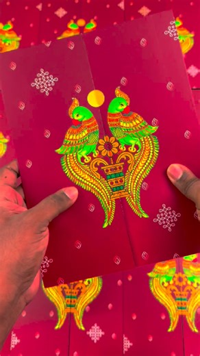 Traditional & Mondern invitations | Design & print on Instagram: "Bold, traditional and beautifully detailed. ❤️✨ This maroon parrot-themed invitation brings together classic Tamil artistry, temple-style borders and intricate kolam motifs — a perfect pick for families who love a grand, heritage-rich printed card. 📩 DM us to customise your traditional printed wedding invitations. ✅ Available in bulk orders ✅ Premium print & finishing ✅ Customisable layout & colours ✅ Classic parrot motif + templ