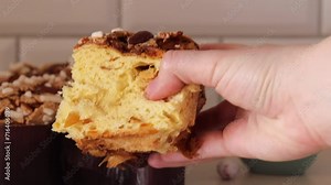 show the pulp of the Colomba Pasquale, a traditional Italian Easter cake shaped like a pigeon. This Easter bread, known as Colomba, is studded with nuts.