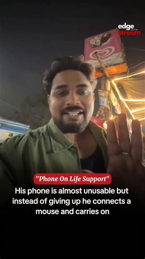 Edge Stream on Instagram: "His phone screen is cracked and the touchscreen has completely stopped working, but instead of giving up or buying a new one, he plugs in a mouse and continues using it like a mini computer. A perfect example of how creativity kicks in when technology gives up. . . Follow us to(@edge.stream) stay updated on what has happened in India over the past 24 hours. . . #lifehack #creativemind #relatable #funny #edgestream"