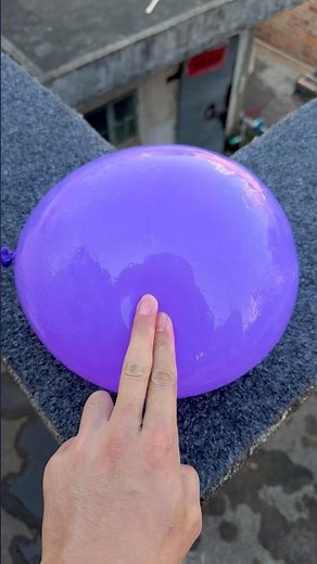 Experiment: Will a water balloon explode if it rolls down a tall building? 💥🎈#shorts