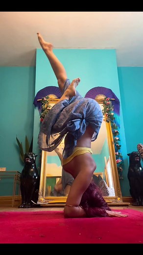 Yoga and Acrobatic Poses in a Cozy Room Setting