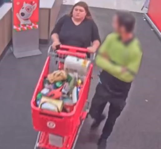 A female shoplifter made off with a loaded cart at an Irvine store