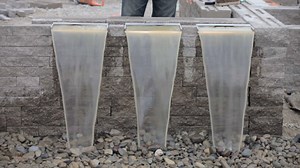 How to Integrate Waterfall Spillways from Aquascape in a Retaining Wall