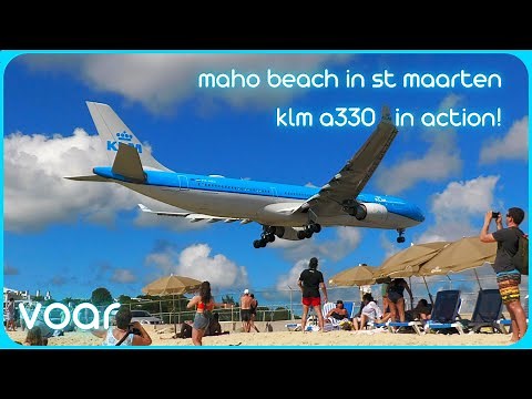 KLM Airbus A330-300 at St Maarten - landing & jetblast takeoff view from Maho Beach!