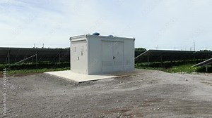 Footage of the transformer and rows of the solar panels in the background, 4k