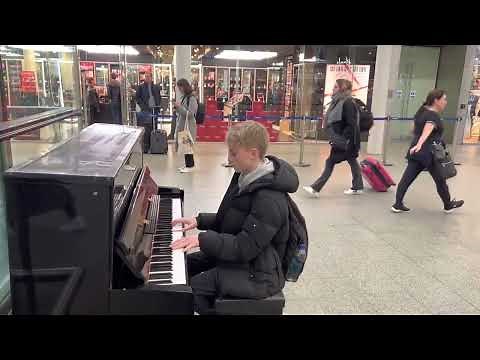 The most Insane Interstellar cover on a train station public piano