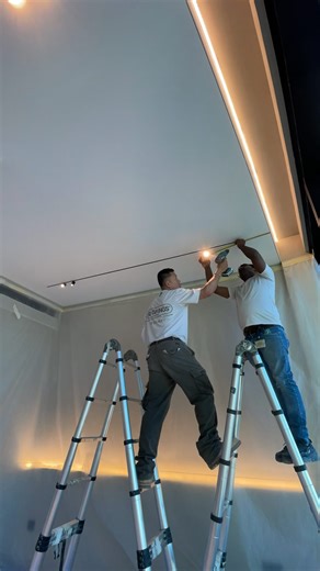 🇦🇪 UAE-Made Track Light & Gypsum Profile Systems on Instagram: "Refresh your ceiling design in just 2 days ⠀ Watch how we install a modern stretch ceiling system with: – Slim Track Lights – Shadow Gap effect around the perimeter – Concealed curtain tracks ⠀ All work is clean and fast — walls and floors are fully protected with film. In just 1–2 days your ceiling is transformed into a stylish, functional design. ⠀ Want to see these solutions live? Visit our showroom in Dubai and explore all pro