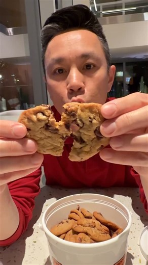 Congee West on Instagram: "Eating Cathy’s cookies for the first time. We saw a long line at Downtown Disney and we just had to."