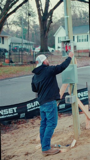 Setting up a new temporary power pole for a brand-new custom home build ✅ #charlottenc #electrician #electricalwork #construction