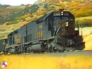 In these scenes shot in 1988, the new route through Thistle is about 5 years old. It includes two tunnels under Billys Mountain. The 1983 Thistle, Utah landslide and subsequent flood forced the Denver & Rio Grande Western to build a new line through the area. From the WB Video Productions show "A Salute to Soldier Summit" https://rfd.video/Soldier | Railfan Depot