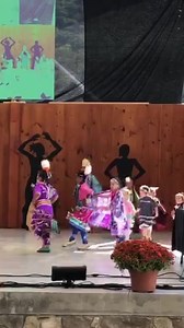 The Kanohesgi Dancers make their entrance onto the stage during a performance at the 107th Cherokee Indian Fair at the Cherokee Indian Fairgrounds on the morning of Wednesday, Oct. 9. (videography by Sheena Brings Plenty) | Cherokee One Feather
