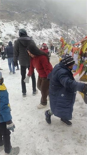 enjoying ice at Nathula pass view point kupup Gangtok Sikkim #travel #love #funny #cute
